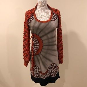 Shrug-like sleeve dress.